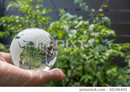 Glass globe and green SDGs environmental protection image 80296408