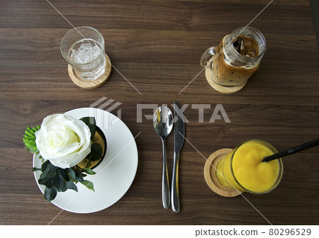 Have breakfast and coffee with orange juice Have breakfast and coffee with orange juice 80296529