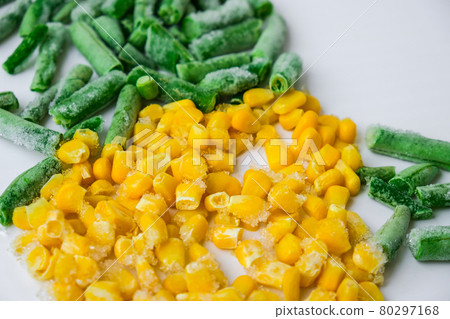 Frozen vegetables food background of yellow corn, green beans. Harvest Food preservation for winter. Veganism, vegetarian healthy eating. 80297168