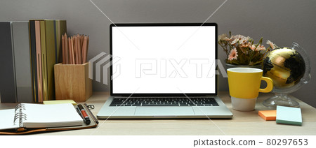 Computer laptop, notebook and coffee cup on white table. Workspace. Computer laptop, notebook and coffee cup on white table. Workspace. 80297653