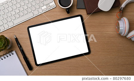 Top view digital tablet with empty display on wooden table. Top view digital tablet with empty display on wooden table. 80297680