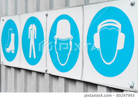 Posters with signs of safety of personal protective equipment in production in a row. Posters with signs of safety of personal protective equipment in production in a row. 80297993