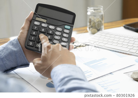 Accountant or banker calculate the cash bill. Accountant or banker calculate the cash bill. 80301926