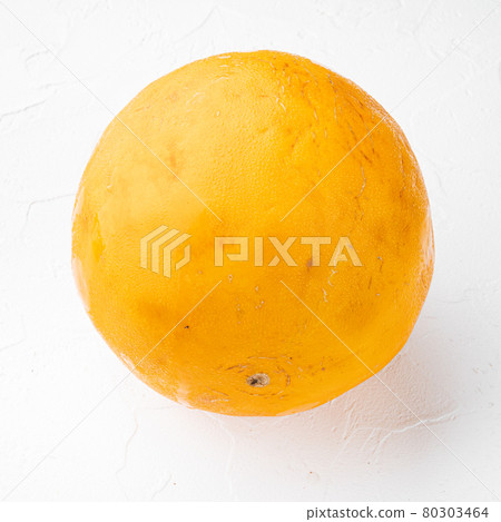 Honeydew melon, on white stone table background 80303464