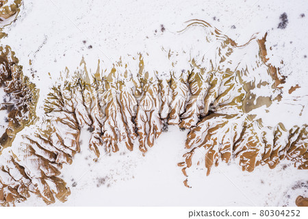 Cappadocia in Winter. Snowy Hills. Turkey. Aerial Top-Down View. Cappadocia in Winter. Snowy Hills. Turkey. Aerial Top-Down View. 80304252