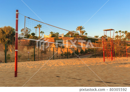 Volleyball net in the morning on beach Volleyball net in the morning on beach 80305592