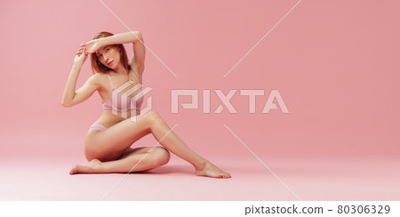 Flyer. Beautiful woman in lingerie posing isolated over pink studio background. Natural beauty, purity, diet, sports, healthy lifestyle and aesthetic cosmetology concept. Flyer. Beautiful woman in lingerie posing isolated over pink studio background. Natural beauty, purity, diet, sports, healthy lifestyle and aesthetic cosmetology concept. 80306329