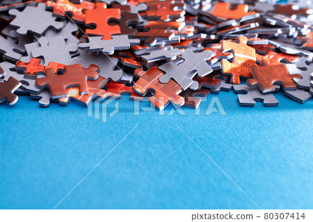 Colorful Jigsaw Puzzle on Blue Background Colorful Jigsaw Puzzle on Blue Background 80307414