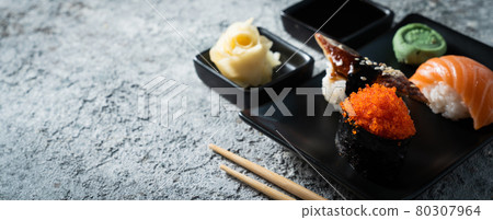 Selection of sushi on rustic background, copy space Selection of sushi on rustic background, copy space 80307964