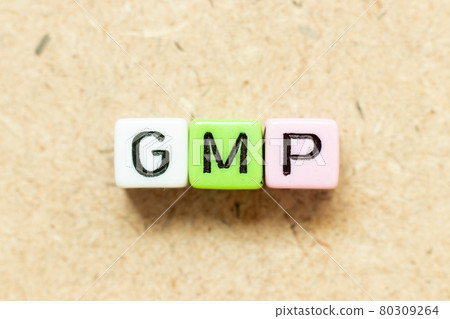 Color alphabet letter block in word GMP (Abbreviation of good manufacturing practice) on wood background Color alphabet letter block in word GMP (Abbreviation of good manufacturing practice) on wood background 80309264
