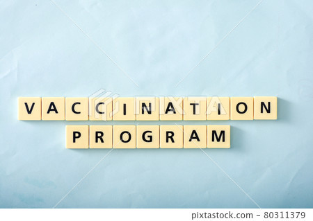 Vaccination program word on blue background 80311379