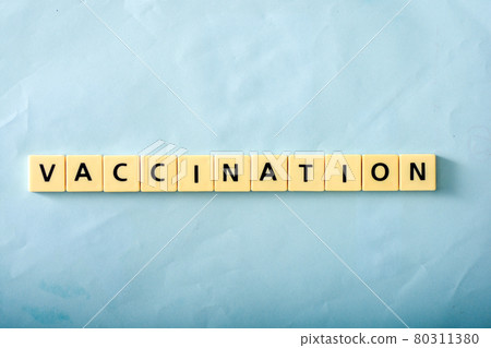 Vaccination word on blue background 80311380
