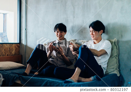 Young male student living in a dormitory 80312197