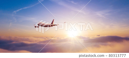 Passengers commercial airplane flying above clouds Passengers commercial airplane flying above clouds 80313777