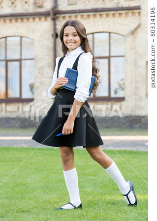 Lesson learnt. Happy small girl back to school. Small kid Lesson learnt. Happy small girl back to school. Small kid 80314198