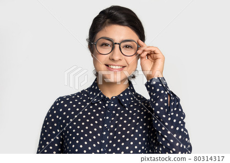 Portrait of happy Indian woman wear glasses 80314317