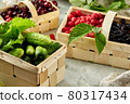 Harvest vegetables in wooden basket on light background 80317434