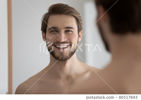 Portrait of happy young bearded attractive metrosexual man Portrait of happy young bearded attractive metrosexual man 80317693