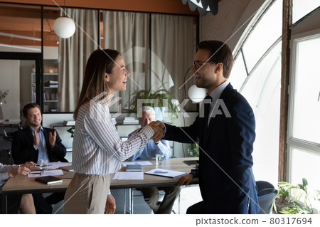 Happy boss expressing recognition, acknowledge to excited proud best employee Happy boss expressing recognition, acknowledge to excited proud best employee 80317694