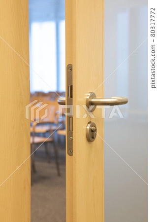 Empty office seen through open door Empty office seen through open door 80317772