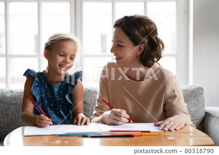 Happy grandmother and small granddaughter drawing together 80318790