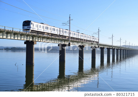 Kashima Line E217 series train crossing a 1236-meter-long bridge over Kitaura Kashima Line E217 series train crossing a 1236-meter-long bridge over Kitaura 80321715