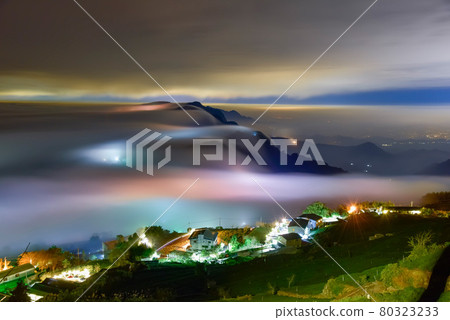 The clouds and fog are floating in the sky above the mountain. The streetlight statues in castle towns are glass lights, beautiful and dreamy. The clouds and fog are floating in the sky above the mountain. The streetlight statues in castle towns are glass lights, beautiful and dreamy. 80323233