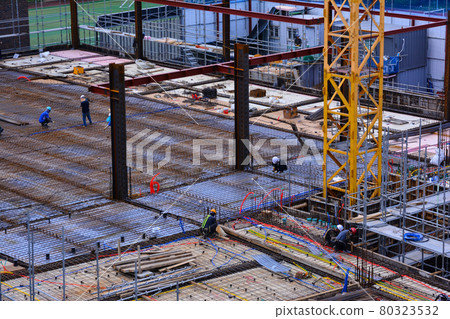 Construction site and tower crane in the city center 80323532