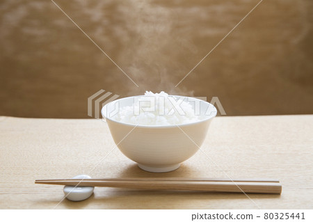 New rice steamed at the table New rice steamed at the table 80325441