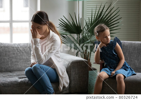 Upset mom and small daughter avoid talking after fight Upset mom and small daughter avoid talking after fight 80326724