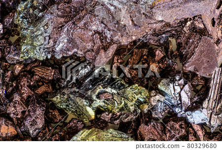 Potassium permanganate crystals under 1.5x magnification microscope - image width 23mm Abstract science background 80329680