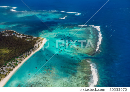 Tropical coastline in Mauritius and blue ocean. Aerial view of One eye beach 80333970