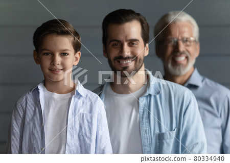 Happy family portrait on three male generations, kid, father 80334940