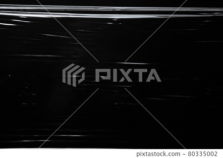 Picture of the plastic wrap on black background Picture of the plastic wrap on black background 80335002