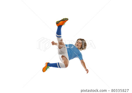 Flyer. Portrait of little male football soccer player, boy training with football ball isolated on white studio background. Concept of sport, game, hobby 80335827
