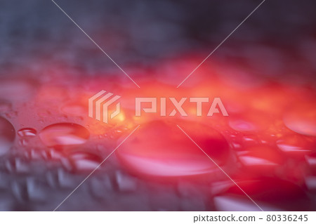 Wet dark glowing abstract background. Blue, purple, and fire colors. Wet dark glowing abstract background. Blue, purple, and fire colors. 80336245