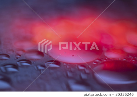Wet dark glowing abstract background. Blue, purple, and fire colors. Wet dark glowing abstract background. Blue, purple, and fire colors. 80336246