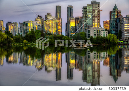 View of Lost Lagoon in famous Stanley Park in a modern city View of Lost Lagoon in famous Stanley Park in a modern city 80337789