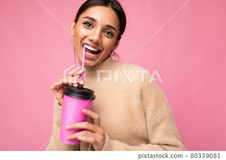 Photo of attractive young happy smiling brunette woman wearing everyday stylish clothes isolated Photo of attractive young happy smiling brunette woman wearing everyday stylish clothes isolated 80339081