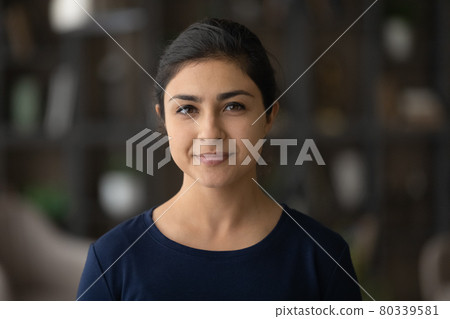 Headshot portrait of smiling Indian woman renter Headshot portrait of smiling Indian woman renter 80339581