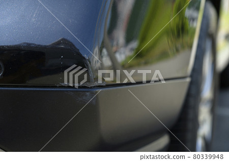 Scratches on the bumper of a car 80339948