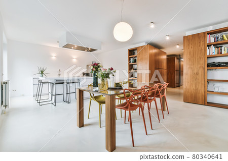 Bright dining room with decorative table and chairs 80340641