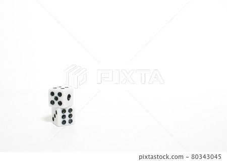 Vertically arranged on the left side of the dice 80343045