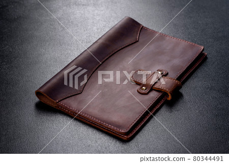 Beautiful leather brown case made of leather designed for a notebook 80344491