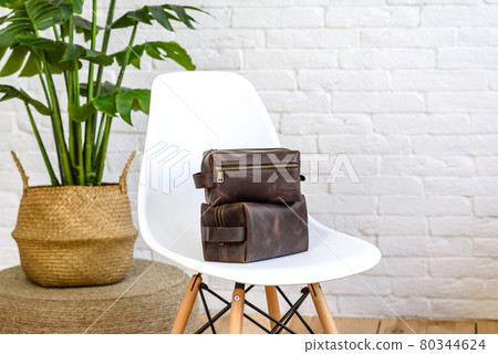 Beautiful brown bag made of leather designed for various items 80344624