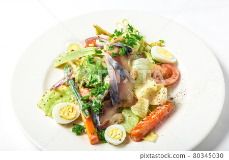 Salad with mackerel fish, zucchini, lettuce, carrots and creamy dressing Salad with mackerel fish, zucchini, lettuce, carrots and creamy dressing 80345030
