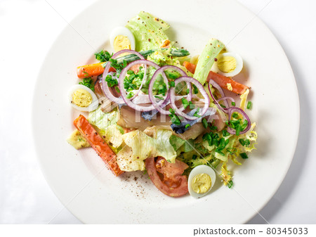 Salad with mackerel fish, zucchini, lettuce, carrots and creamy dressing Salad with mackerel fish, zucchini, lettuce, carrots and creamy dressing 80345033