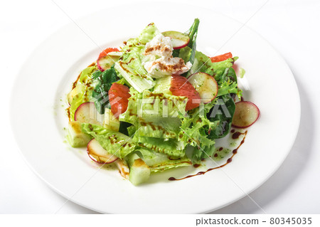 Fresh salad with lettuce, radishes, grapefruit, cheese and citrus dressing Fresh salad with lettuce, radishes, grapefruit, cheese and citrus dressing 80345035