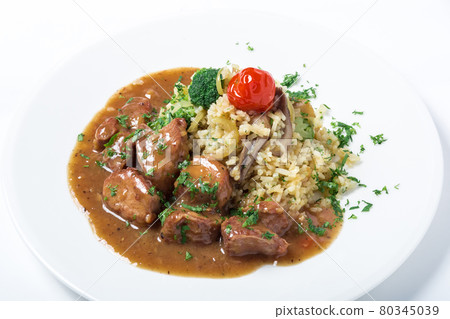 Turkey meat with rice, broccoli, mushrooms and gravy decorated greens. Turkey meat with rice, broccoli, mushrooms and gravy decorated greens. 80345039