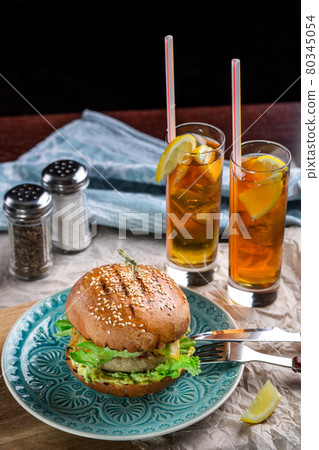 Sandwich with chicken burger, cheese and lettuce Sandwich with chicken burger, cheese and lettuce 80345054